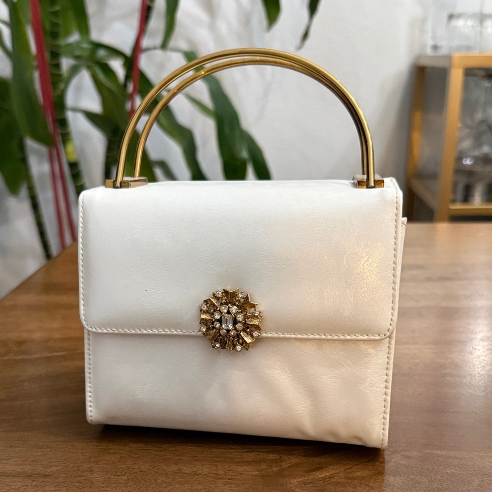 Elegant White Caprice Handbag with Gold Accents